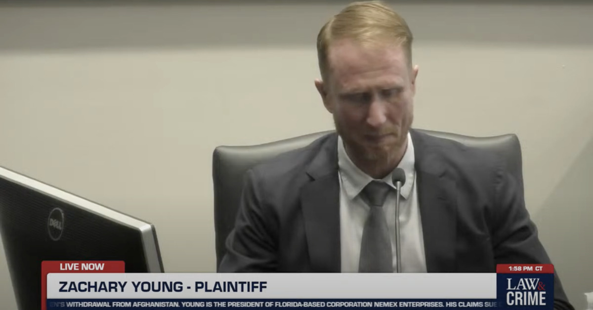 Zachary Young hangs his head in a Florida courtroom.