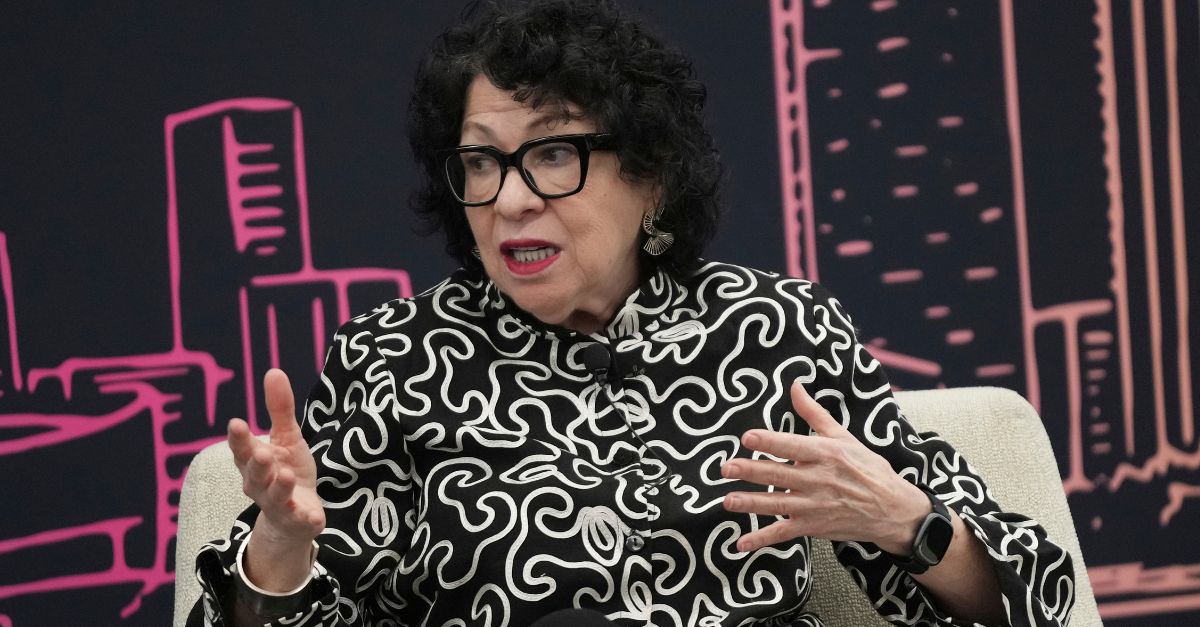 Sotomayor gestures with her hands.