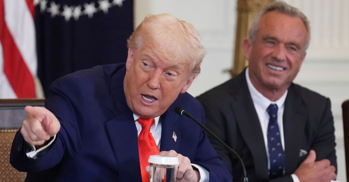 President Donald Trump, left, speaks as Health and Human Services Secretary Robert F. Kennedy Jr. listens during a Make America Healthy Again (MAHA) Commission Event in the East Room of the White House, Thursday, May 22, 2025, in Washington (AP Photo/Jacquelyn Martin).