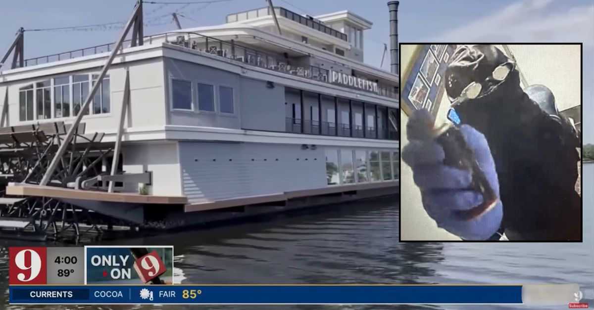 Background: Paddlefish restaurant at Disney Springs in Orlando, Florida (WFTV/YouTube). Inset: A man in scuba gear who allegedly robbed the establishment (Orange County Sheriff