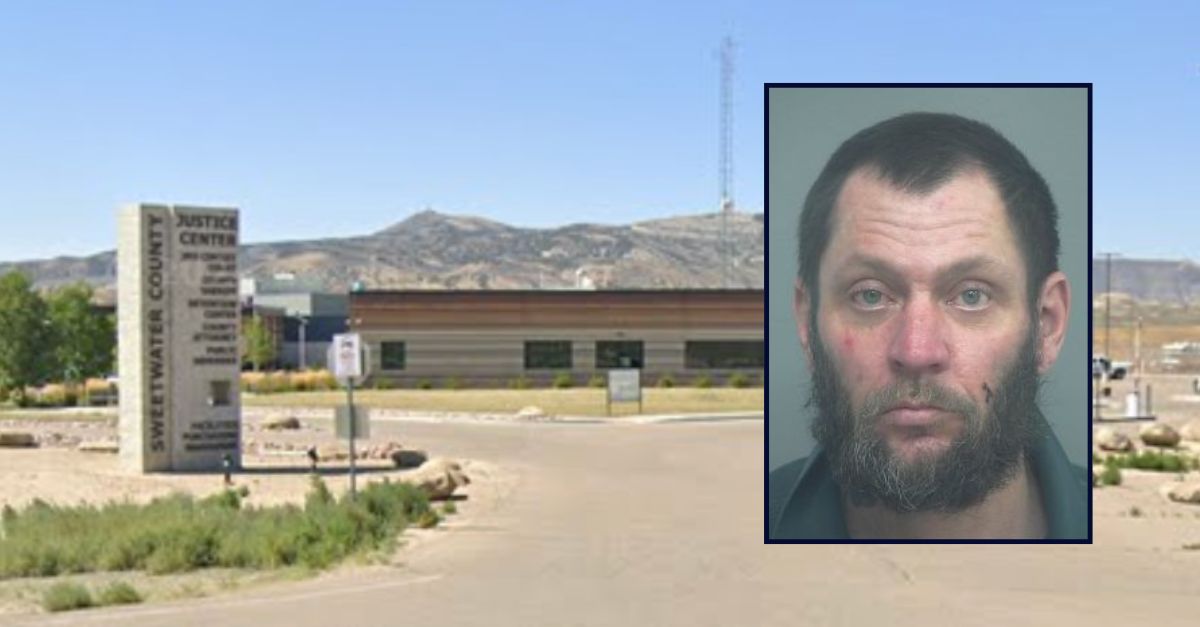 Travis Scott Warren appears in a booking photo inset against an image of the Sweetwater County Justice Center in Wyoming.