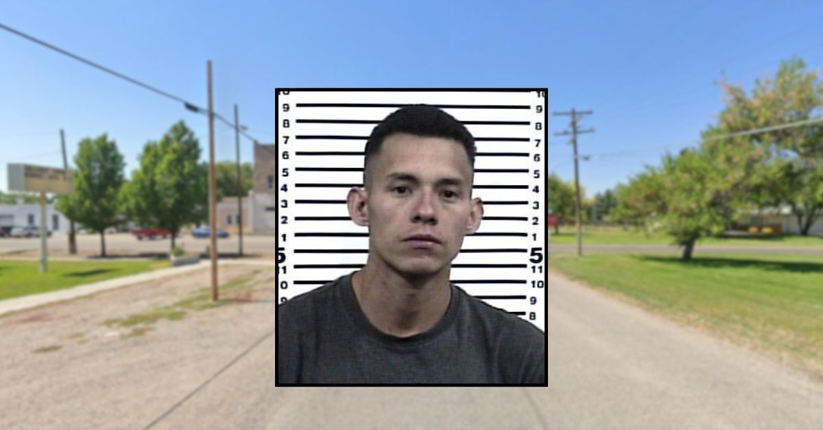 Ronny Aloimar Escalante-Nino appears in a booking photo inset against an image of a street in Idaho.