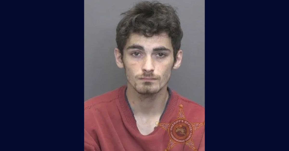 Cyrous Baker appears in a booking photo.