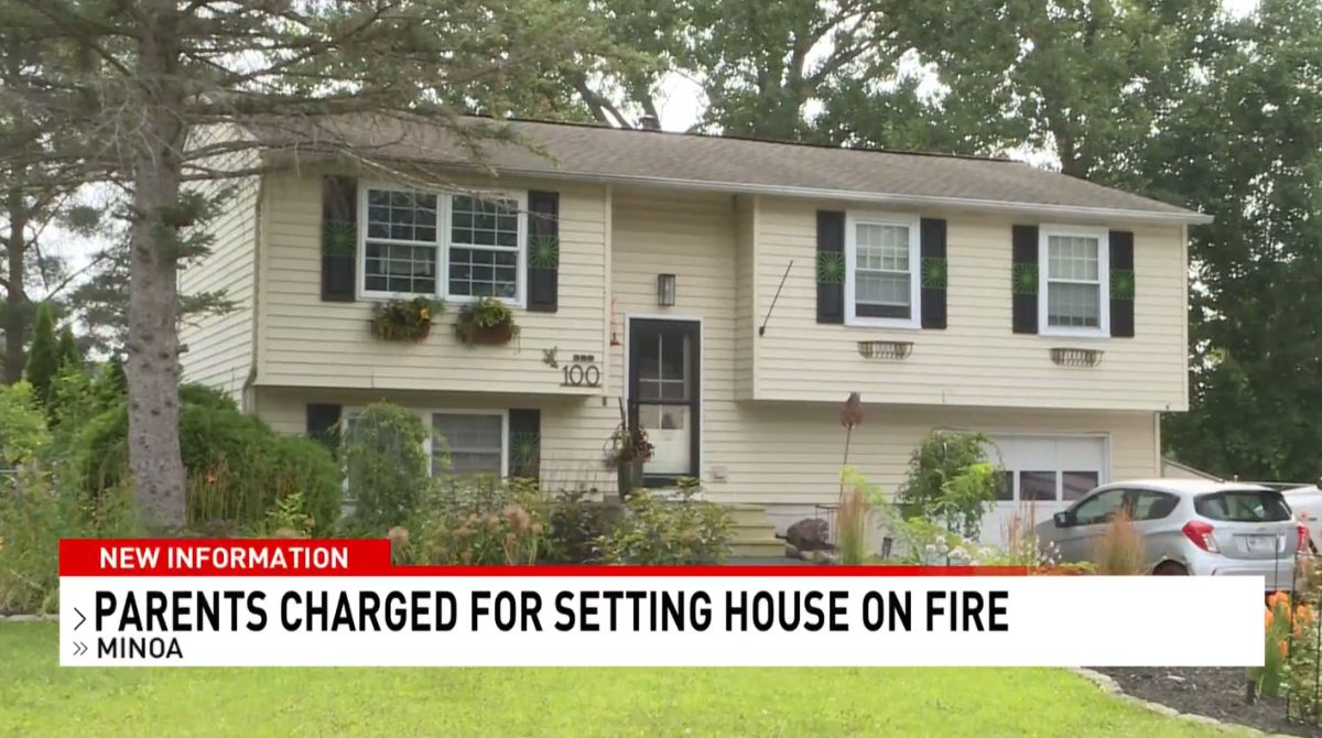Parents arrested after house fire