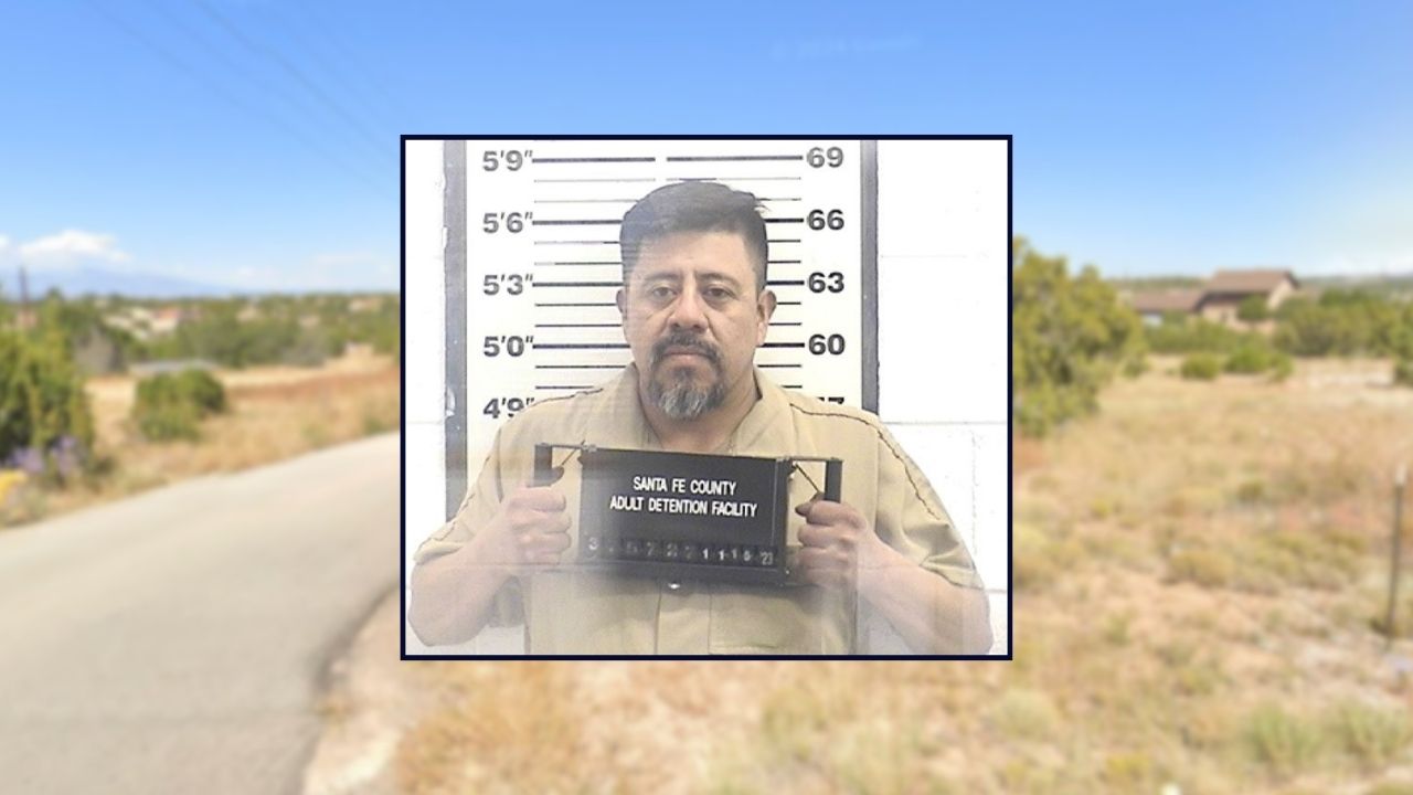 Jose Antonio "Adrian" Roman appears in a booking photo inset against an image of a residential street in New Mexico.